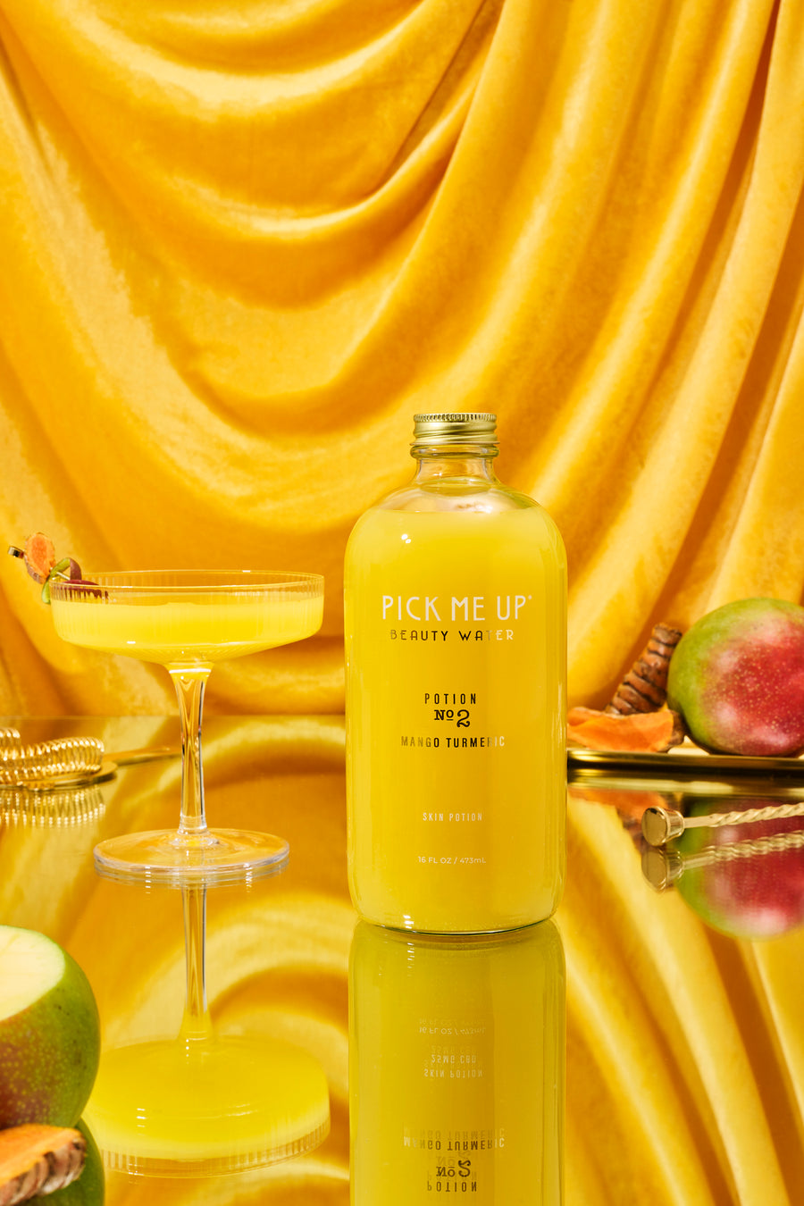 Pick Me Up Potions Mango Turmeric drink – functional skincare beverage for glowing skin, made with hyaluronic acid and antioxidants